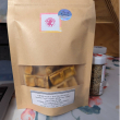 Puree Pumpkin, Wheat Flour, Organic Peanut Butter and Eggs. The product has all natural ingredients, No additives and No preservatives
